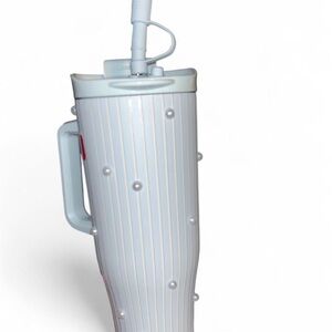 White and blue striped insulated bottle with peal detailing and Handle